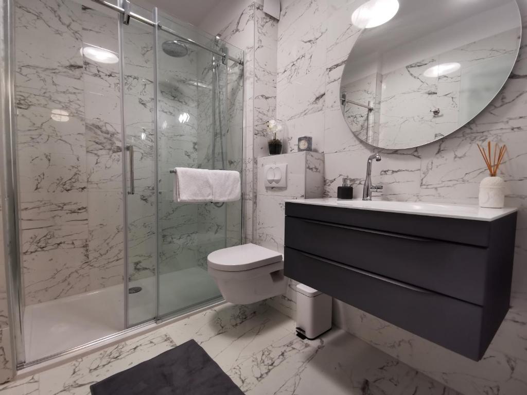 Koupelna v ubytování Merla Luxury Rooms