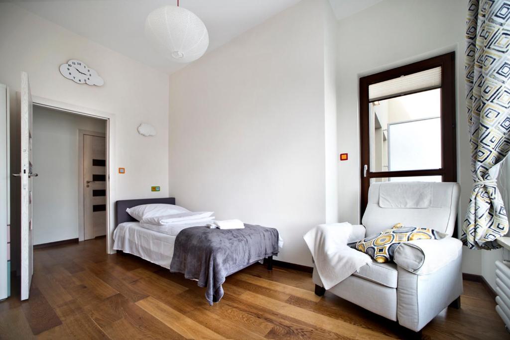 Posteľ alebo postele v izbe v ubytovaní Jana Kazimierza 57 Serviced Apartments