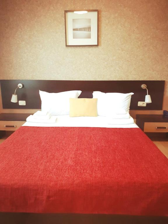 Postel nebo postele na pokoji v ubytování Hotel Nord