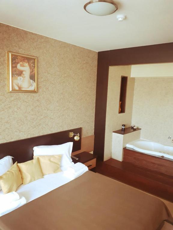 Postel nebo postele na pokoji v ubytování Hotel Nord