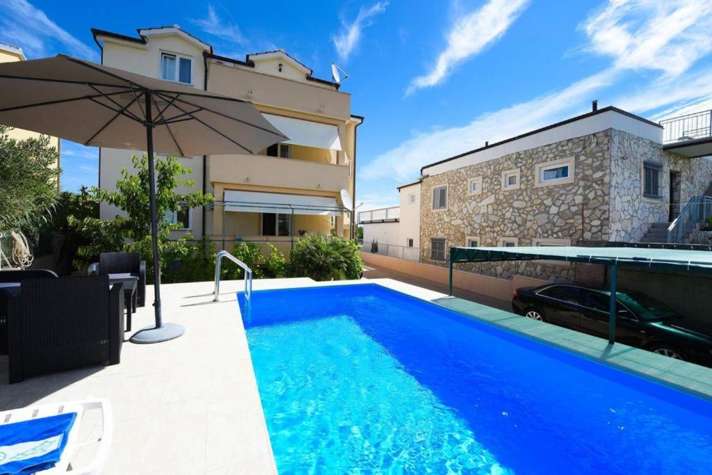 Swimming pool sa o malapit sa Apartments Marjanovic