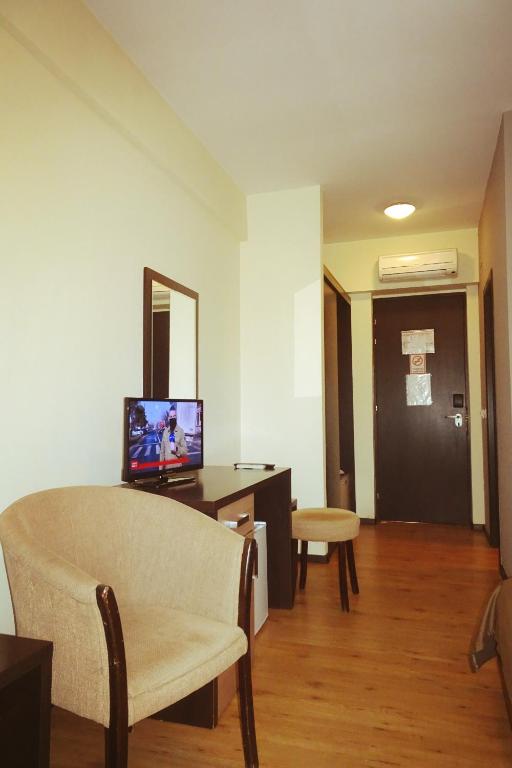 TV a/nebo společenská místnost v ubytování Hotel Nord