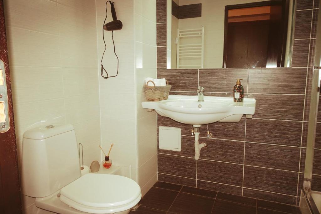 Koupelna v ubytování Hotel Nord