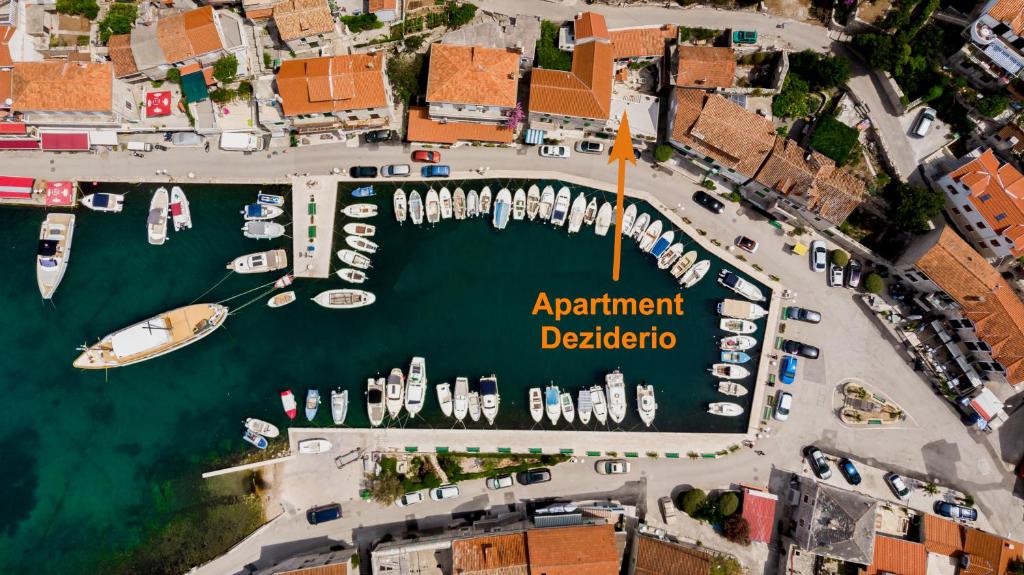 an aerial view of a marina with boats in the water at Deziderio in Stomorska