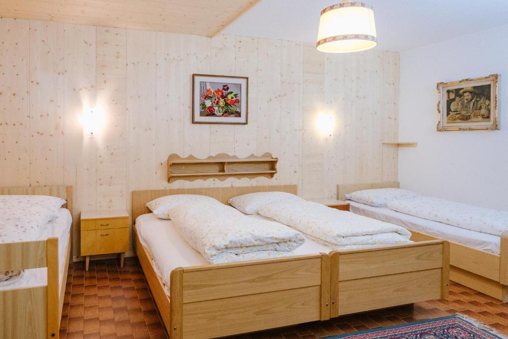 Postel nebo postele na pokoji v ubytování Garni Fany