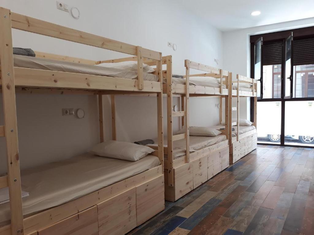 Postel nebo postele na pokoji v ubytování Hub Hostel Seville