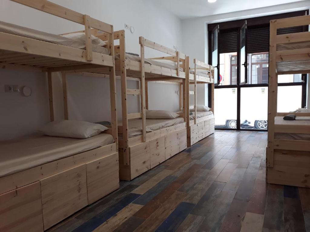 Postel nebo postele na pokoji v ubytování Hub Hostel Seville