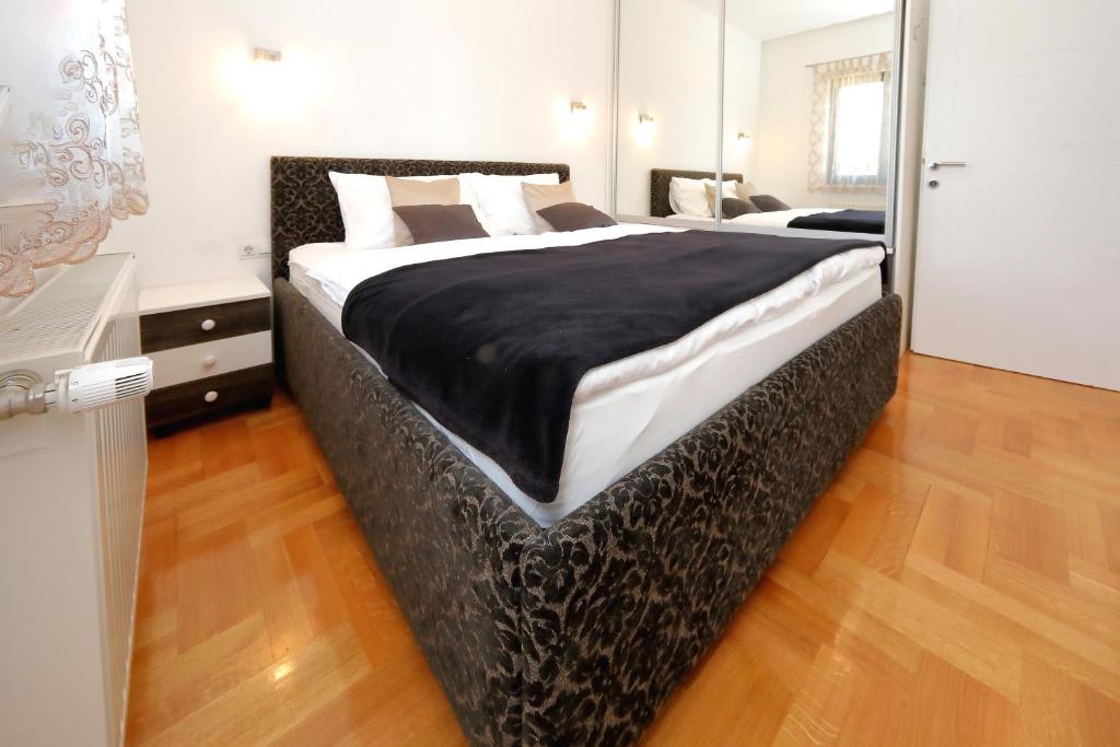 Postel nebo postele na pokoji v ubytování Villa Topesa 1
