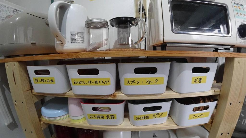 Kuchyň nebo kuchyňský kout v ubytování BBQ可 1日1組限定 貸切別荘 秘密基地 は恐竜博物館まで3km スキージャム勝山まで12km