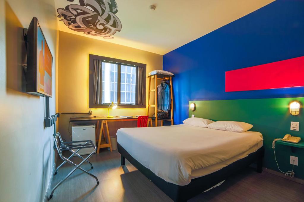 
Cama ou camas em um quarto em ibis Styles SP Faria Lima
