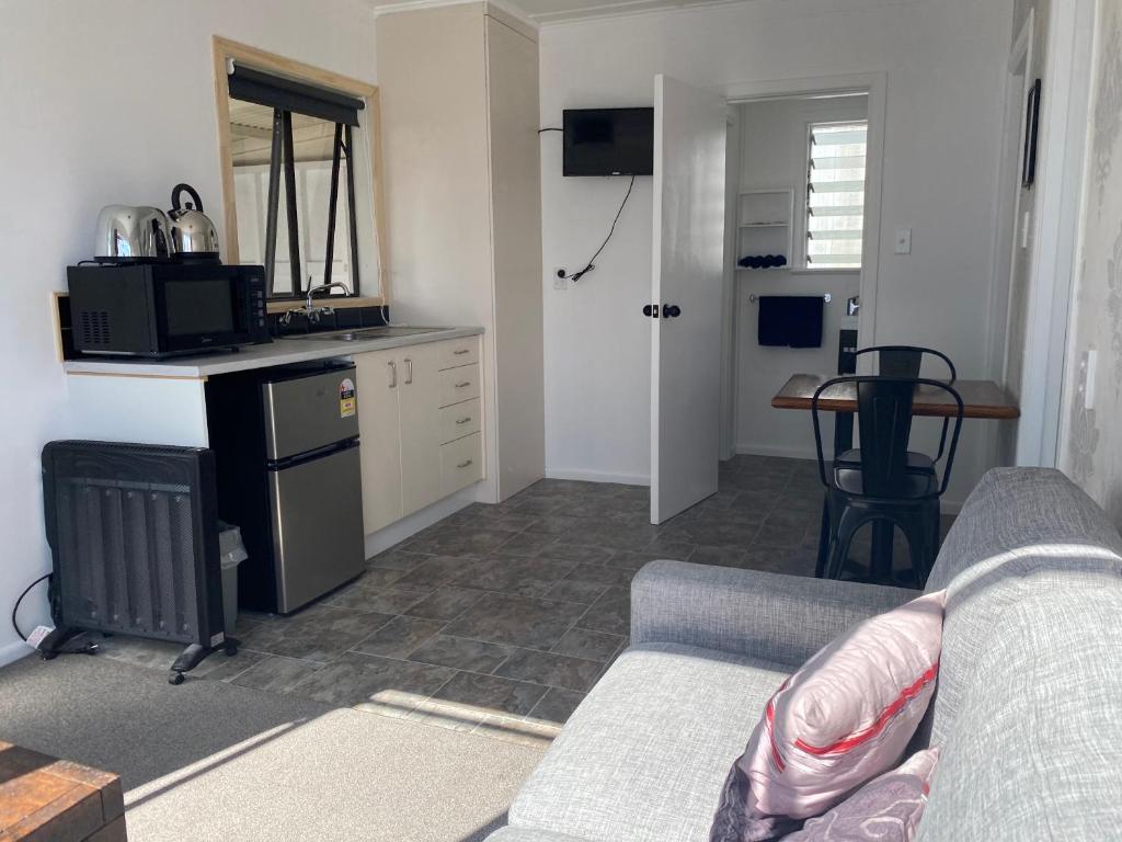 Kuchyň nebo kuchyňský kout v ubytování Windsor Motel
