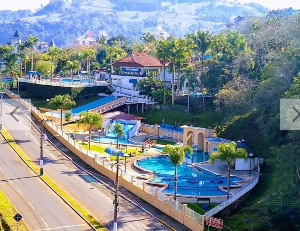 an aerial view of a resort with a swimming pool at Thermas Palace in Piratuba