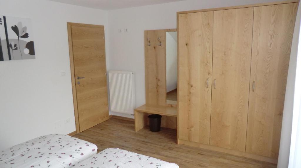 Postel nebo postele na pokoji v ubytování Garni Pircher
