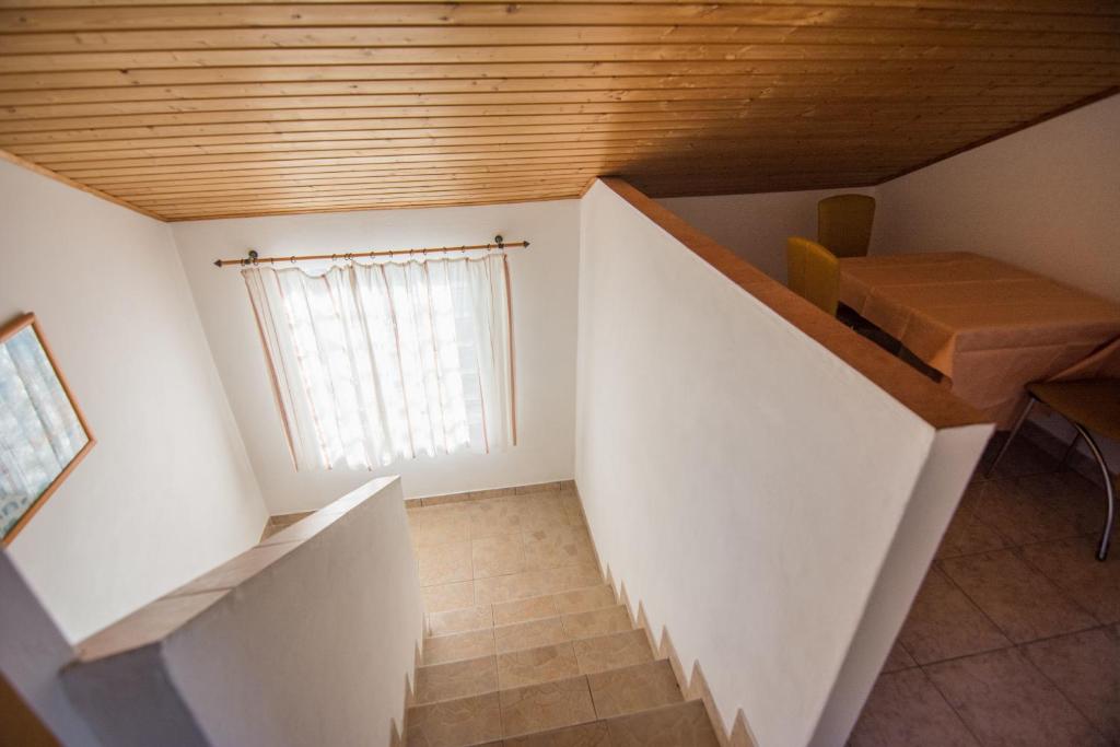 Łóżko lub łóżka w pokoju w obiekcie House Otusi