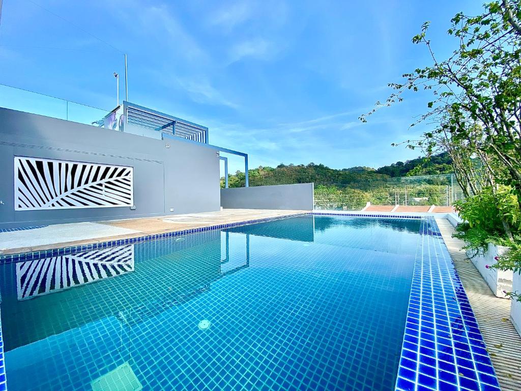 Bazén v ubytování The Palms Residence - SHA Extra Plus nebo v jeho okolí