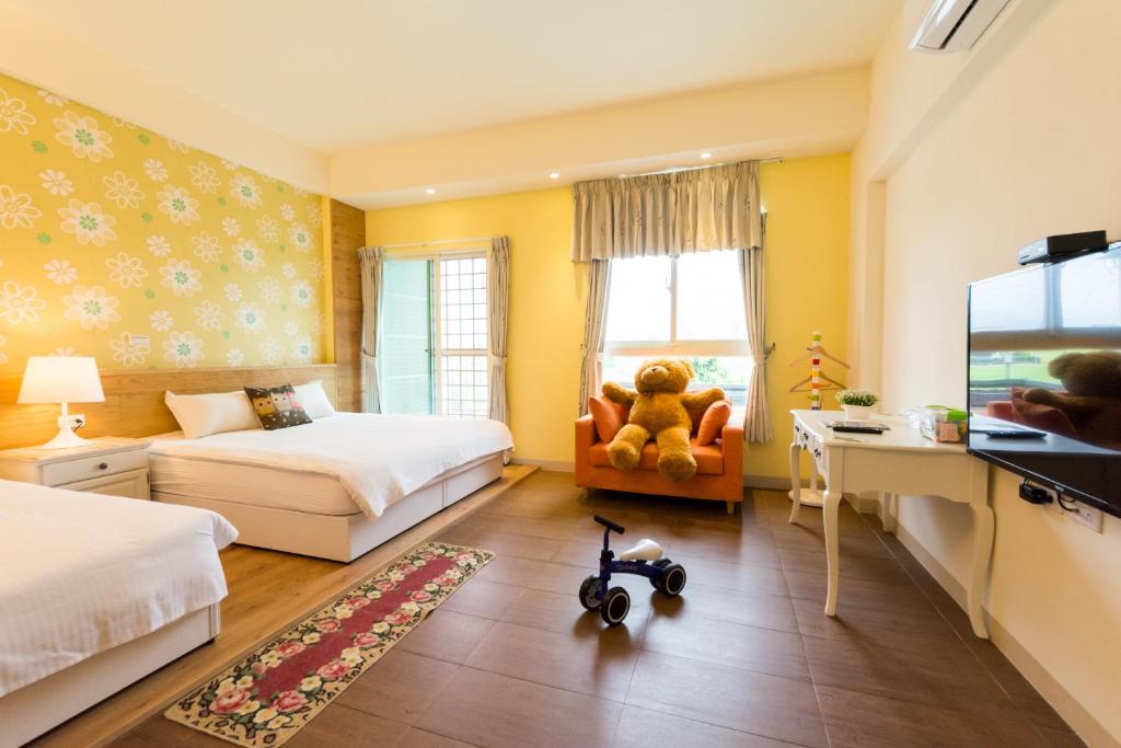 Postel nebo postele na pokoji v ubytování Sky Bird Garden B&B