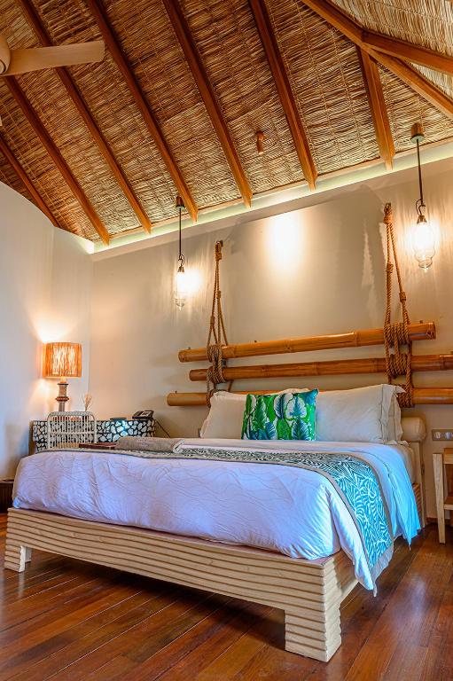 Postel nebo postele na pokoji v ubytování Constance Moofushi Maldives - All Inclusive