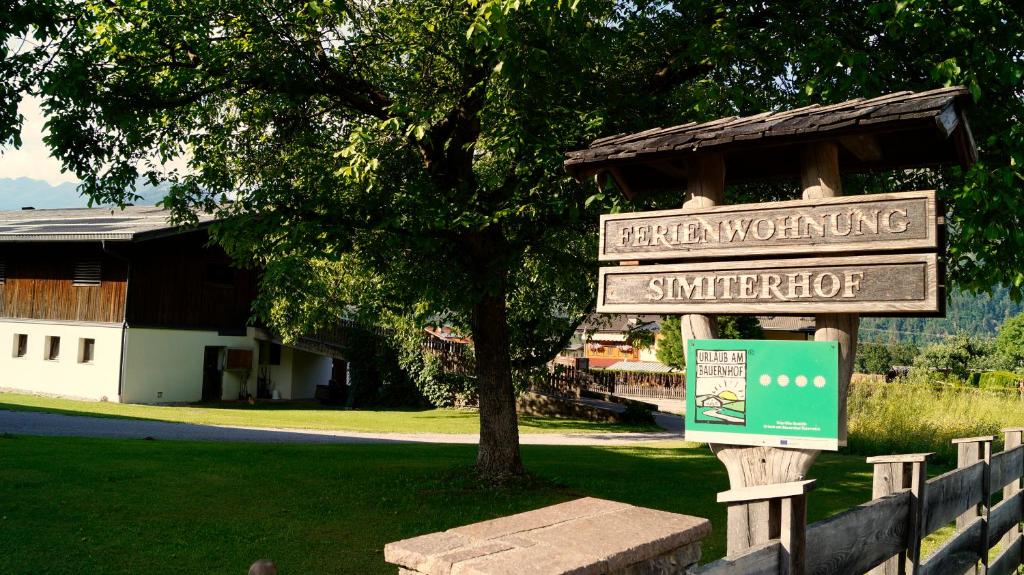 a sign for the american working simulator in a park at Simiterhof Lavant in Lavant