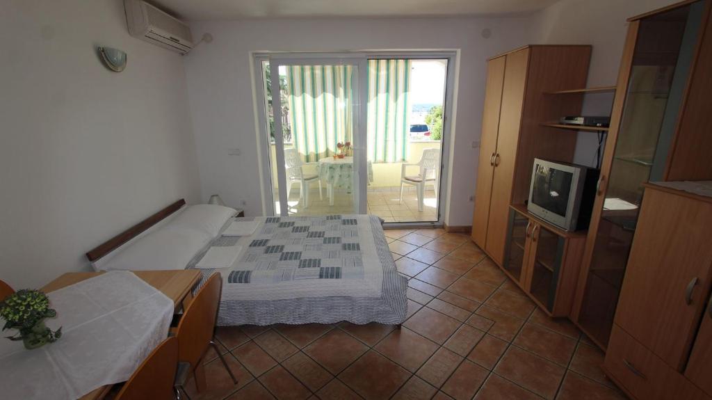 Kuchyň nebo kuchyňský kout v ubytování Apartments Grahovac
