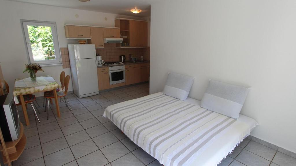 Kuchyň nebo kuchyňský kout v ubytování Apartments Grahovac
