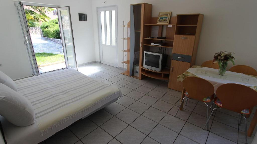 Kuchyň nebo kuchyňský kout v ubytování Apartments Grahovac