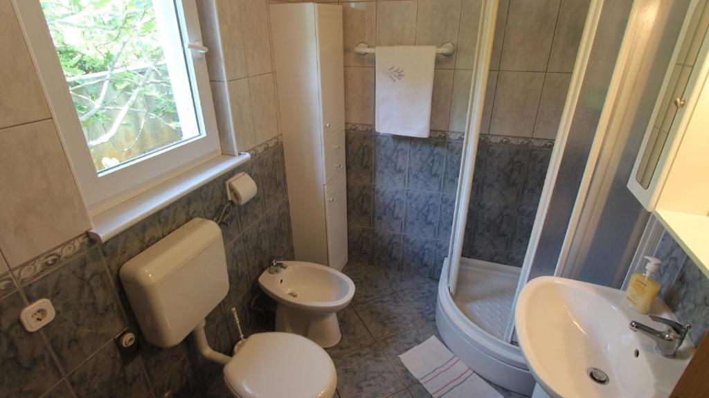 Koupelna v ubytování Apartments Grahovac