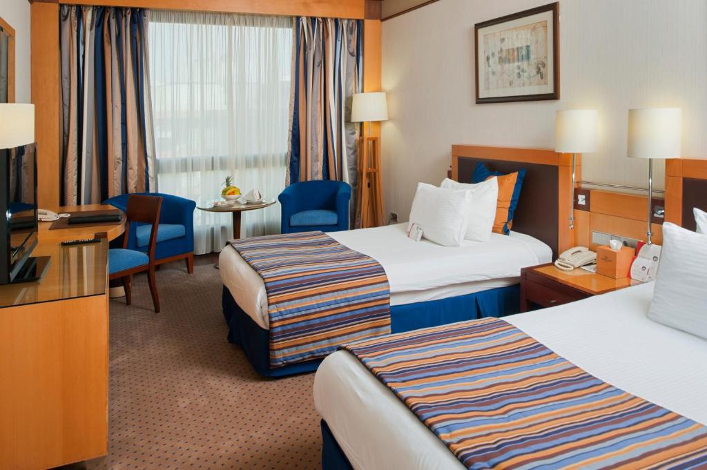 Postel nebo postele na pokoji v ubytování Crowne Plaza Hamra Beirut by IHG