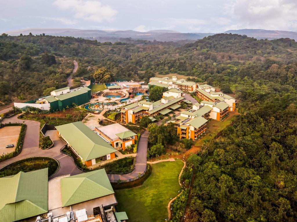 an aerial view of a resort in the mountains at Club Mahindra Assonora in Assonora