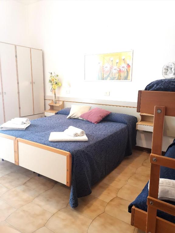 Postel nebo postele na pokoji v ubytování Hotel Alcazar