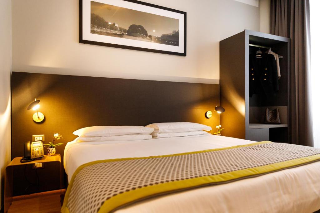 Postel nebo postele na pokoji v ubytování The Cross Hotel