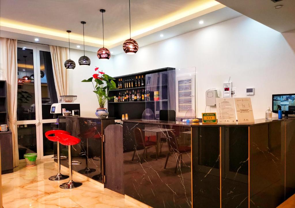 TV a/nebo společenská místnost v ubytování CSI Group - Hotel Metropoli