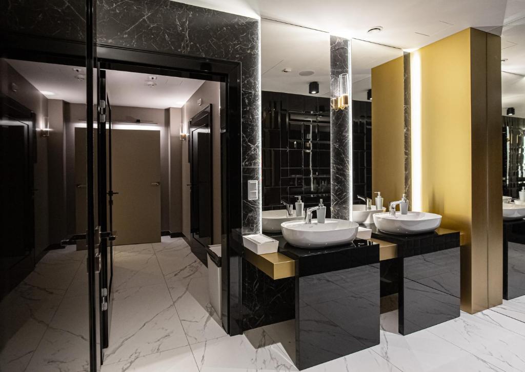 Koupelna v ubytování Trofana Wellness & SPA