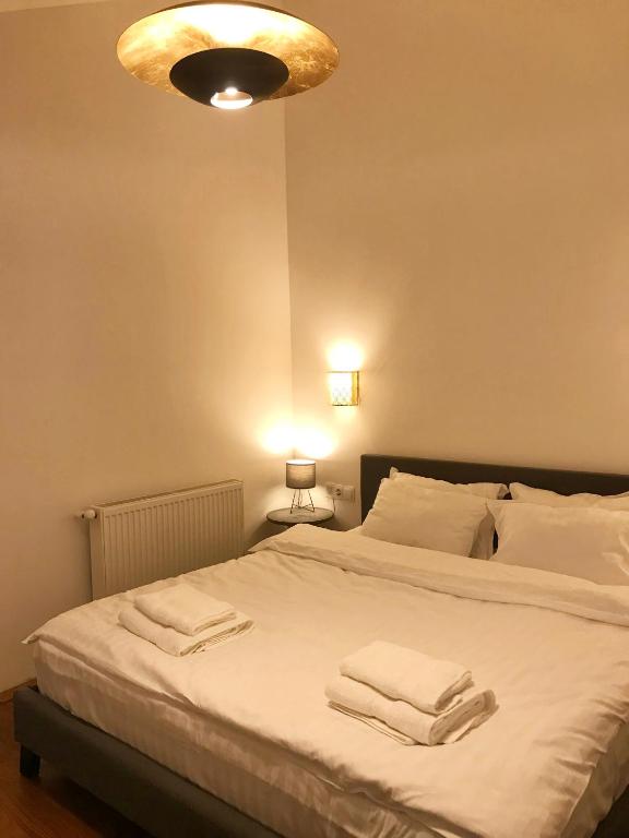 Postel nebo postele na pokoji v ubytování GVC 4-room 421 New Gudauri