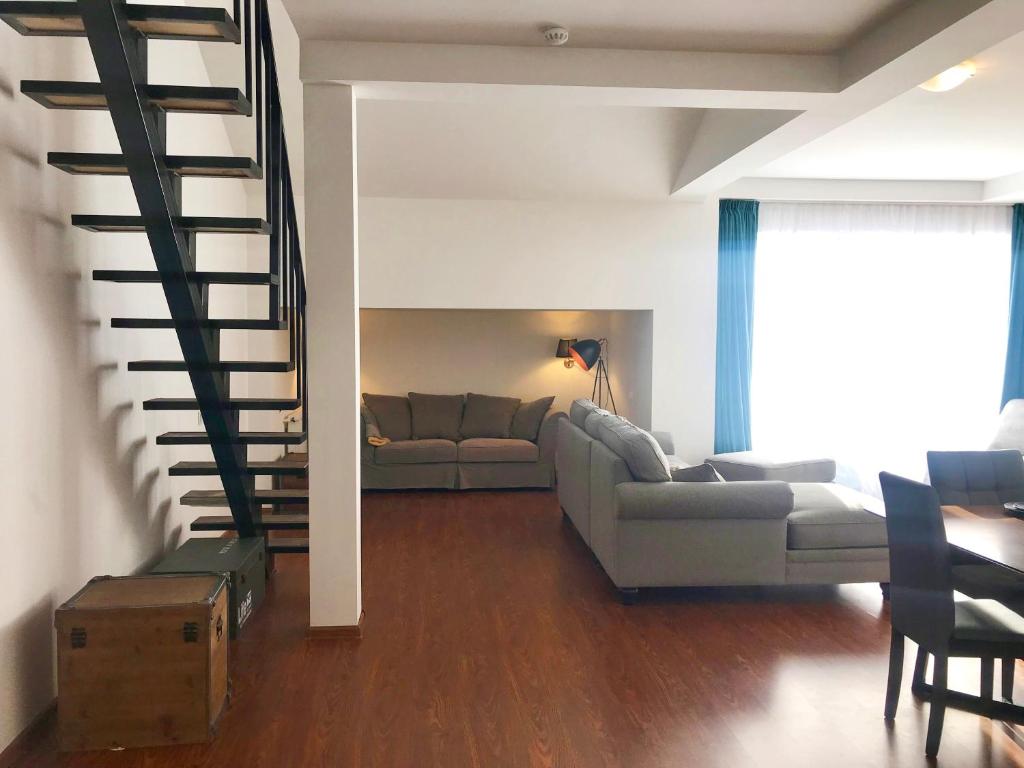 Posezení v ubytování GVC 4-room 421 New Gudauri