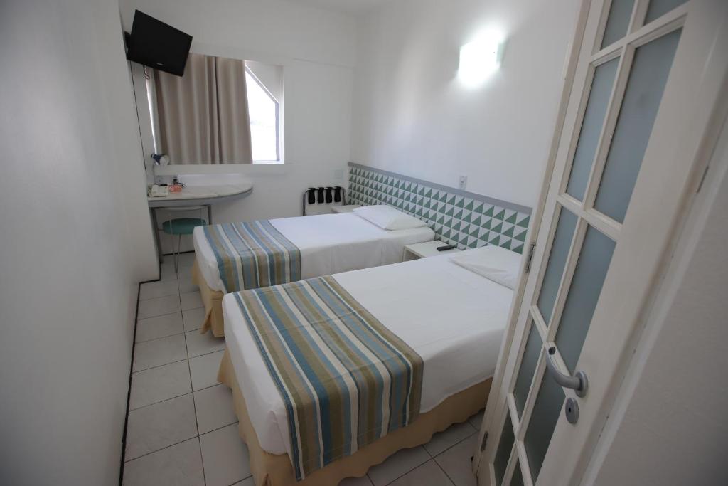Postel nebo postele na pokoji v ubytování Ibis Budget Salvador