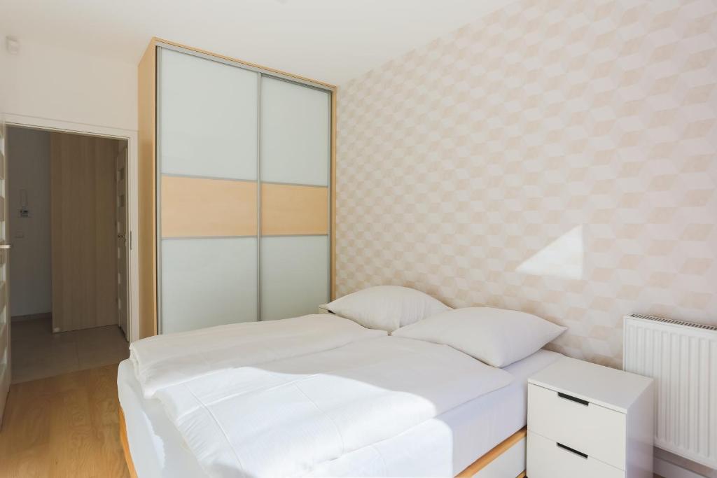 Posteľ alebo postele v izbe v ubytovaní Apartamenty Świnoujście - Rezydencja Sienkiewicza