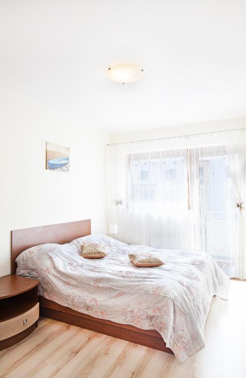 Posteľ alebo postele v izbe v ubytovaní Apartamenty Świnoujście - Rezydencja Sienkiewicza