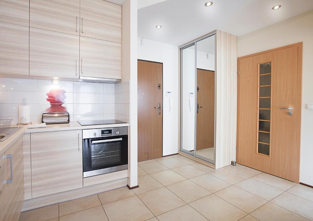 Kuchyňa alebo kuchynka v ubytovaní Apartamenty Świnoujście - Rezydencja Sienkiewicza