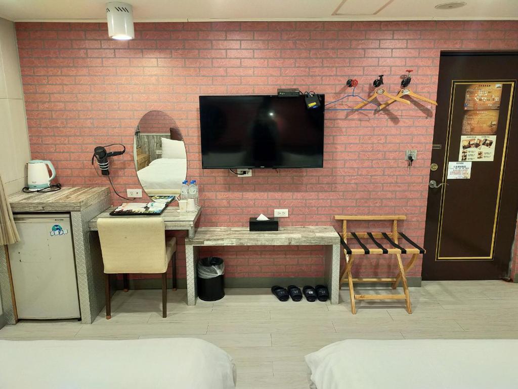 TV a/nebo společenská místnost v ubytování Bin Chen Business Hotel