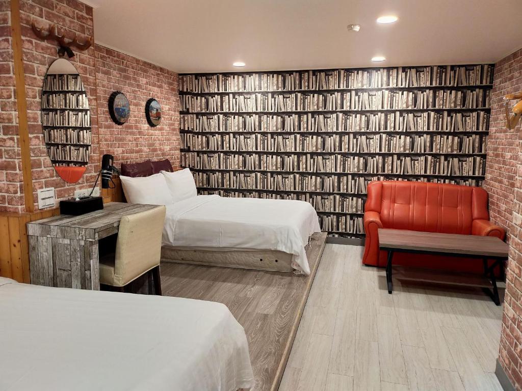 Postel nebo postele na pokoji v ubytování Bin Chen Business Hotel