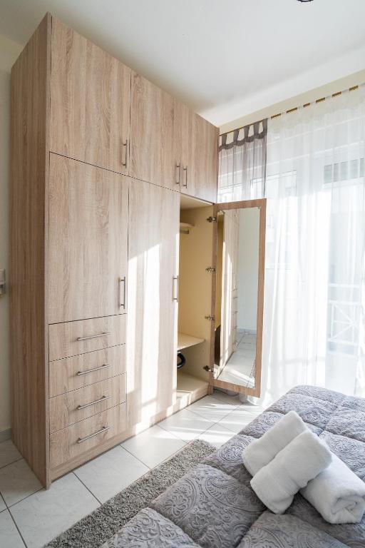 Łóżko lub łóżka w pokoju w obiekcie Yellow Fresh Apartment 2