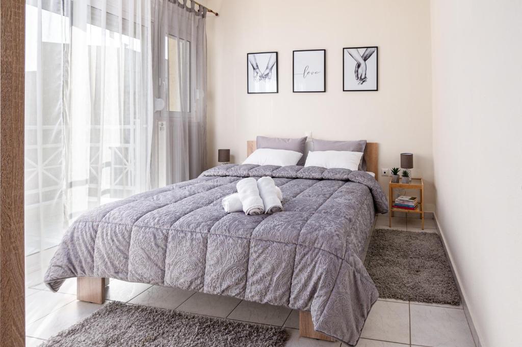 Łóżko lub łóżka w pokoju w obiekcie Yellow Fresh Apartment 2