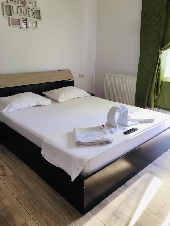 Postel nebo postele na pokoji v ubytování Casa Famous