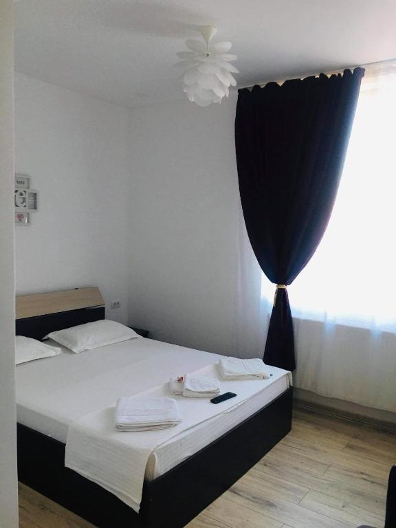 Postel nebo postele na pokoji v ubytování Casa Famous