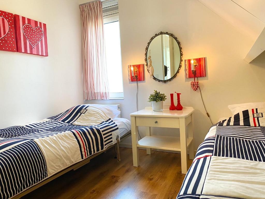 Postel nebo postele na pokoji v ubytování Luxe Vakantiehuis Oostkapelle OK32