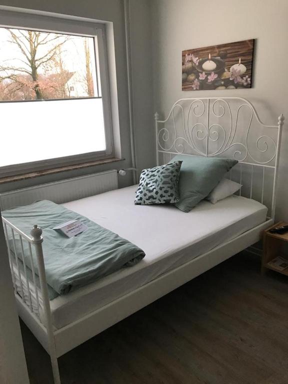 Ένα ή περισσότερα κρεβάτια σε δωμάτιο στο Clarkes Apartments
