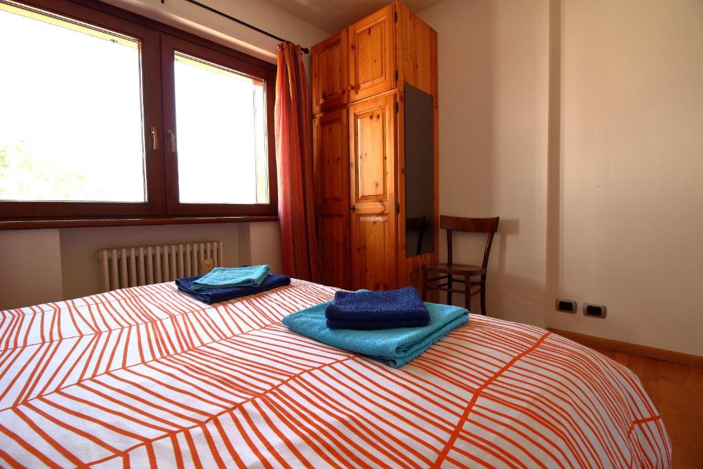 Postel nebo postele na pokoji v ubytování Nonostantetutto B&B