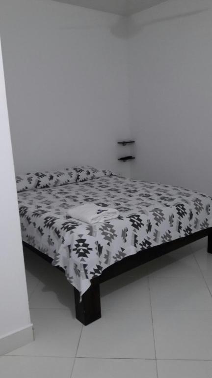 Postel nebo postele na pokoji v ubytování HOTEL TANIA