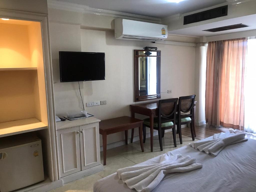 TV a/nebo společenská místnost v ubytování Jumbotel Hotel