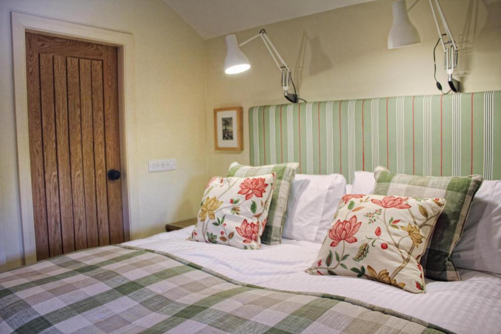 Postel nebo postele na pokoji v ubytování The Fountaine Inn